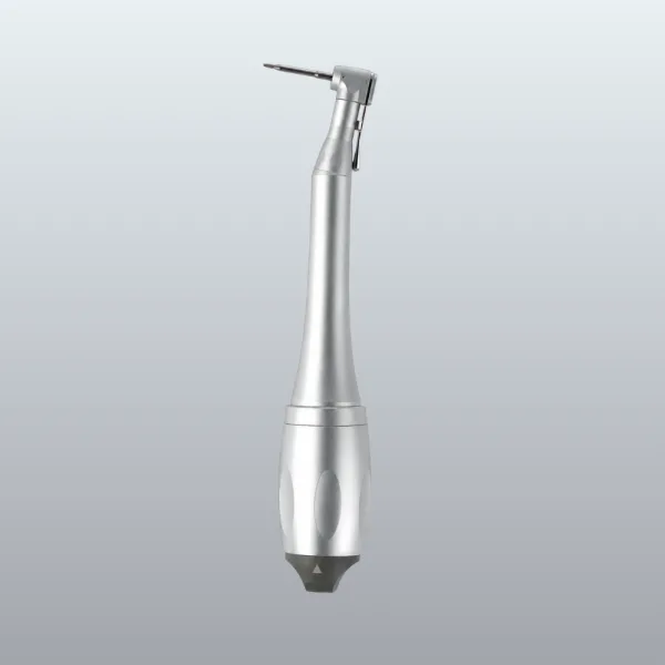 Silver dental drill handpiece with inline nozzle set against a light gray gradient background (informative product image)