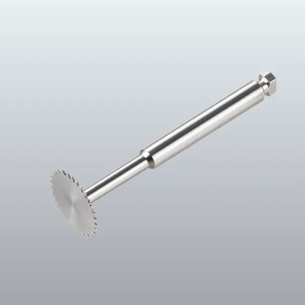 Circular saw blade on a metal mandrel with hex nut at end, used for cutting or trimming materials.